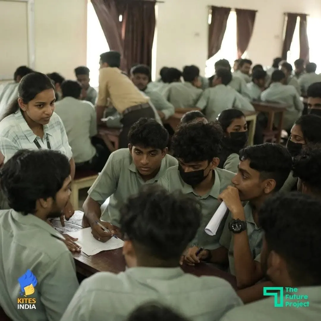 Students collaborating in a group discussion during a workshop