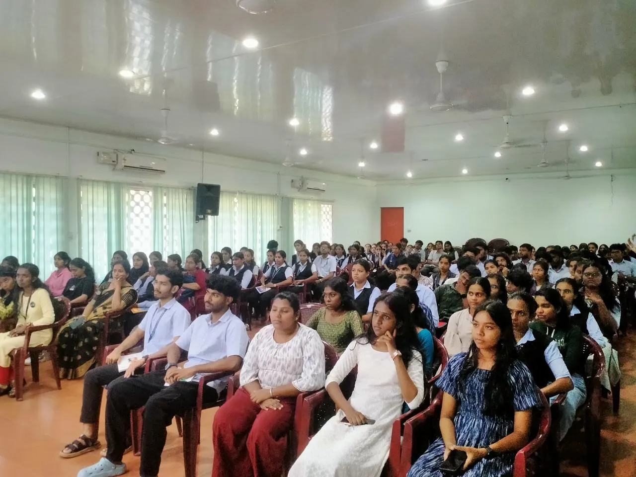 Students attending a Skill Bridge Kerala session in a college auditorium