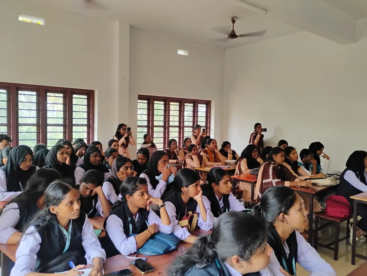 Students attending a classroom session