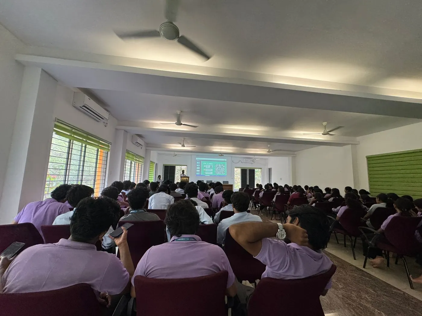 Auditorium-wide view of a Skill Bridge Kerala enrolment session